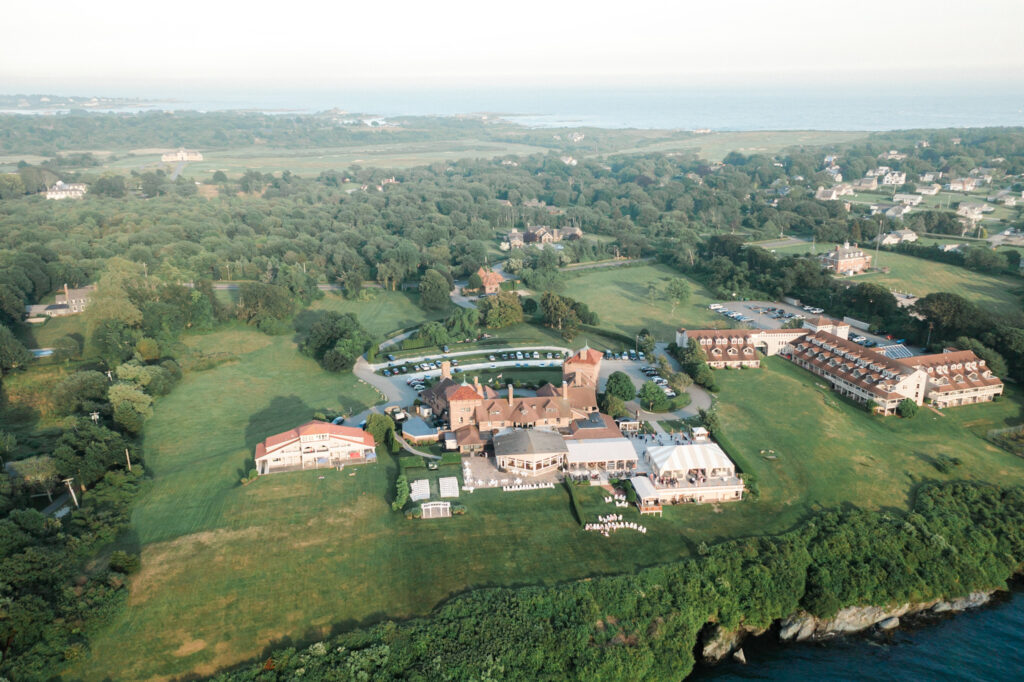 drone shot of oceancliff from the sky displaying the whole property and coastline